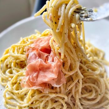 Coppa Osteria signature dishes Spaghetti CarbonaraBistecca alla FiorentinaZeppole